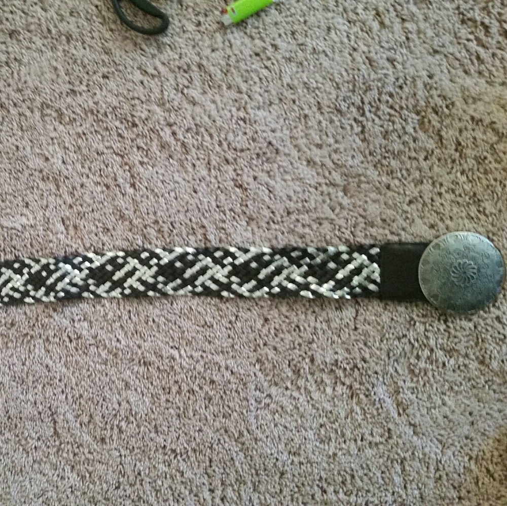 Wide belt with large decorative buckle